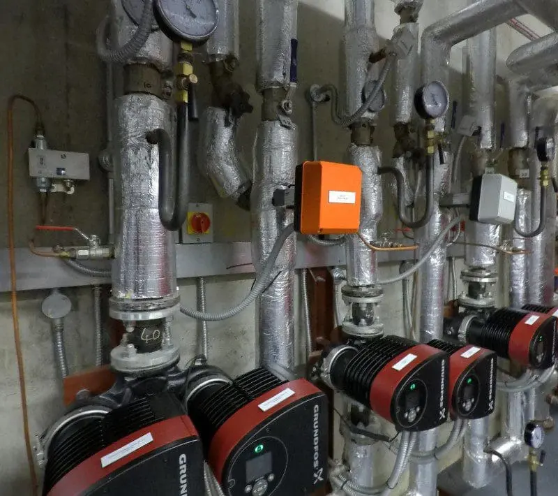 A bunch of pipes that are in the wall