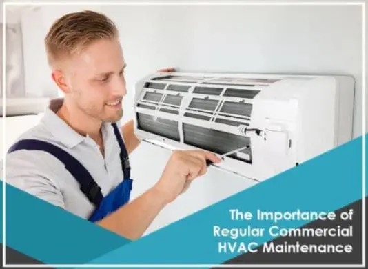 HVAC Commercial Technician Repairing an Air Conditioning Unit An HVAC commercial technician is repairing an air conditioning unit, ensuring it operates efficiently for a business environment