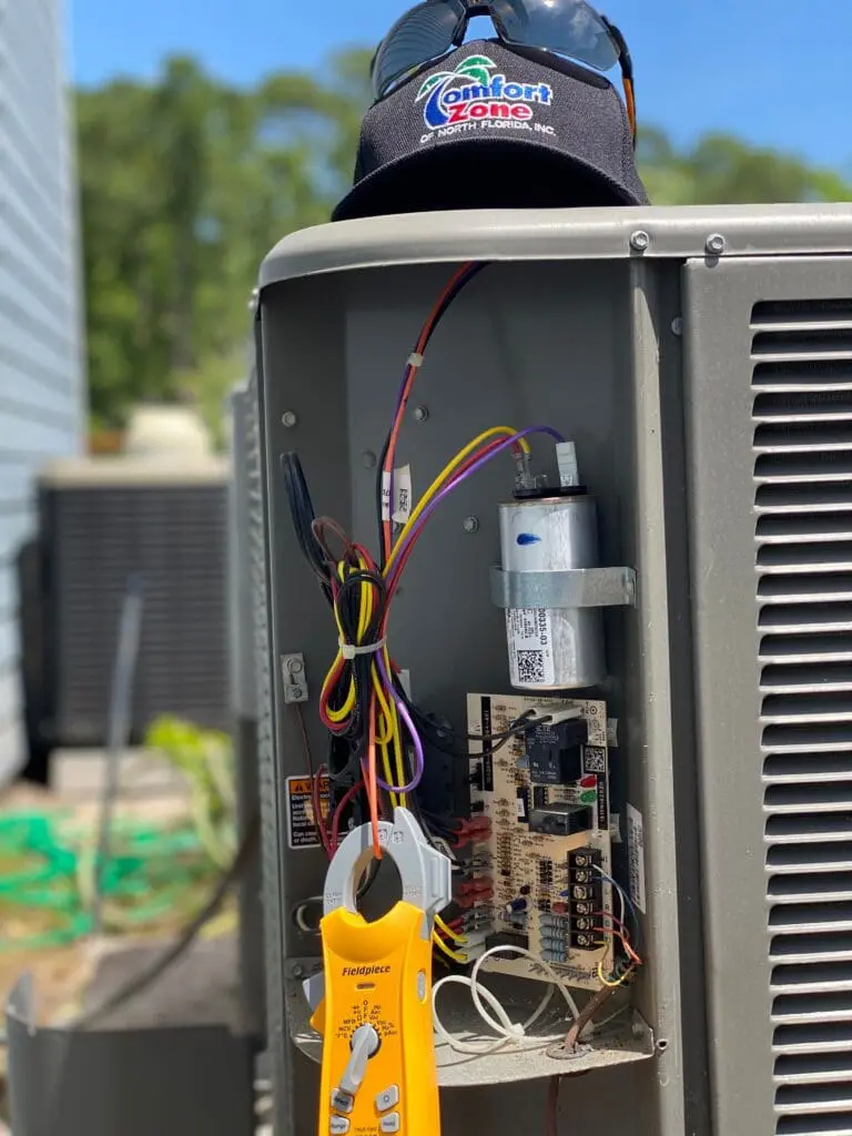 AC system check-up with tools and parts on a fully stocked van, ready for efficient repairs and maintenance in Jacksonville