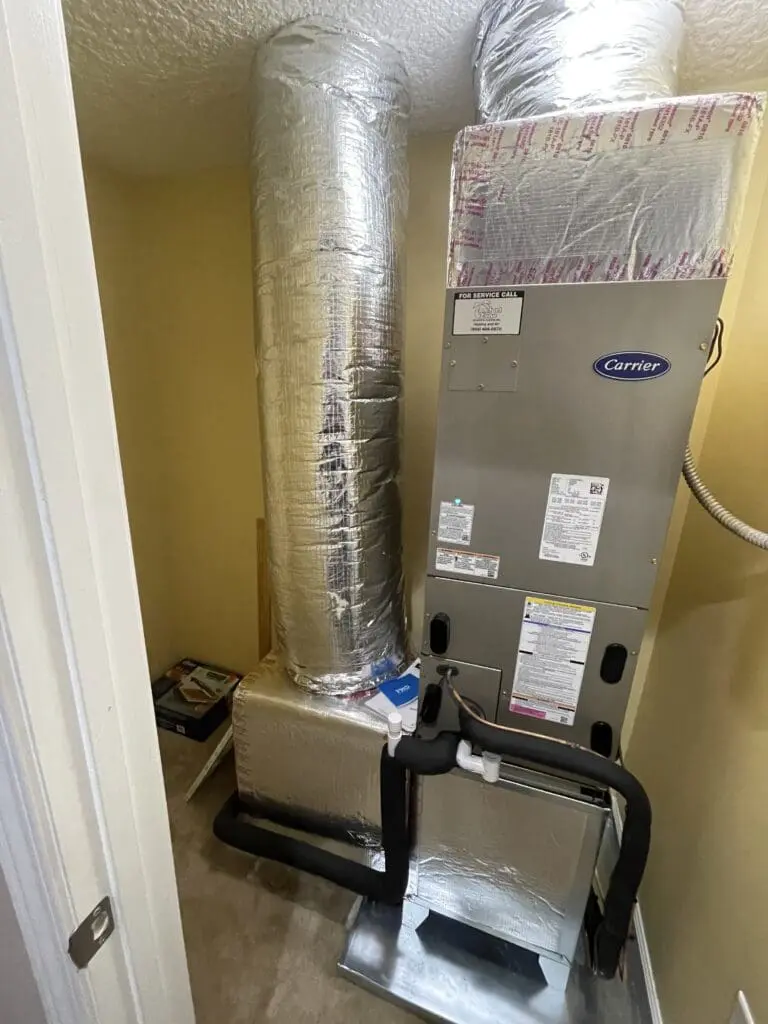 New AC air handler installation providing improved airflow and energy-efficient cooling for a Jacksonville home.