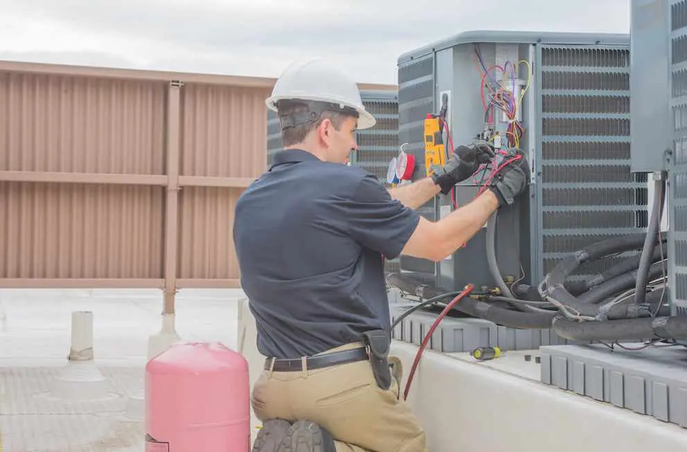 Screenshot at Apr 20 12-56-52 Rooftop HVAC technician testing unit wiring