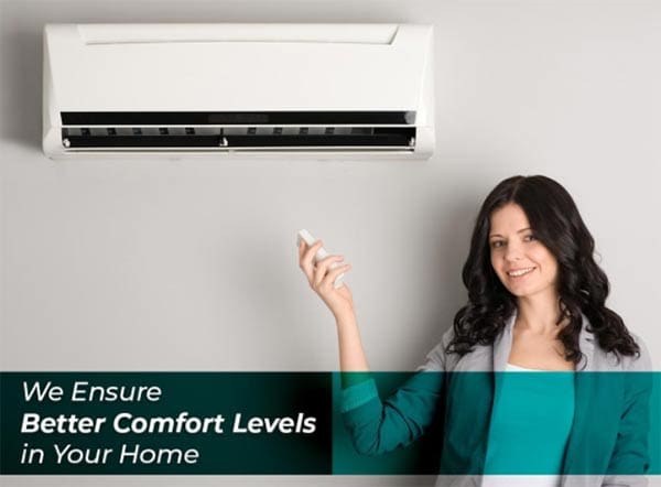 A woman smiling while using a remote control to operate a wall-mounted air conditioner, with text stating "we ensure better comfort levels in your home".