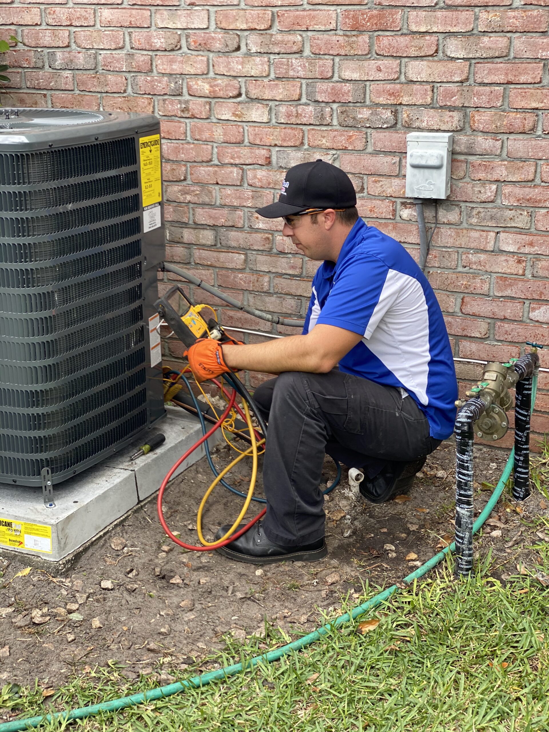 A licensed technician performing a diagnostic check to ensure the HVAC system operates efficiently and maintains proper airflow.