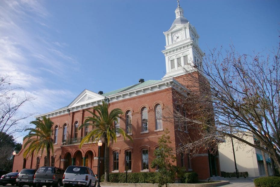 Historic red brick courthouse with clock tower