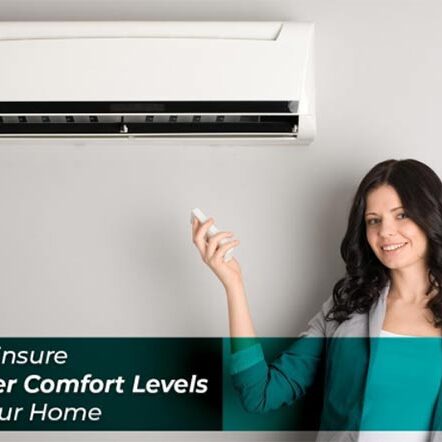 A woman smiling while using a remote control to operate a wall-mounted air conditioner, with text stating "we ensure better comfort levels in your home".