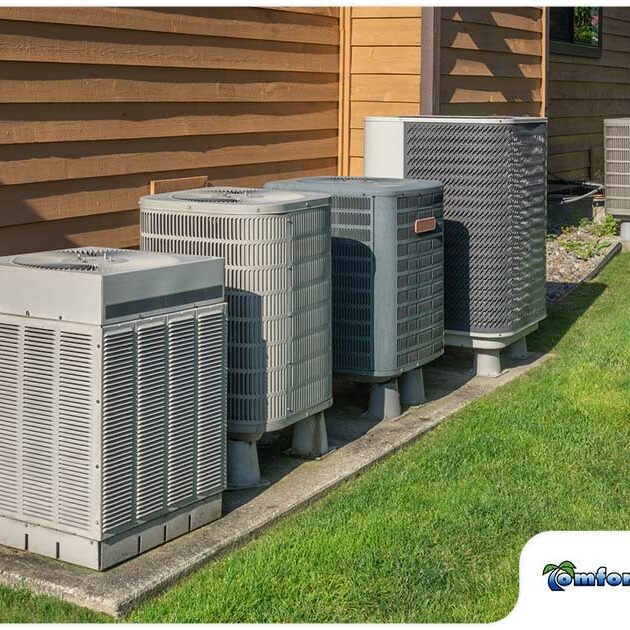 Air conditioning units located on the side of a residential building